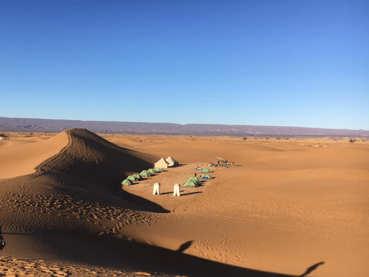 Nomadic bivouac tent in the Sahara Desert near Lake Iriki under a star-filled night sky
