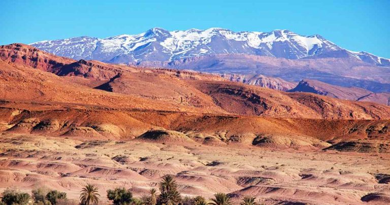 Scenic desert landscape near Ouarzazate with traditional Berber village